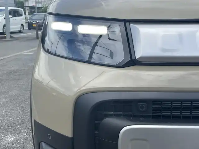 ホンダ フリード ハイブリット e:HEV クロスター 神奈川県 2025(令7)年 0.3万km ベージュＭ 安全機能装置/・衝突軽減システム/・横滑り防止装置/・レーンキープアシスト/・パーキングアシスト/・ブラインドスポットインフォメーション/アダプティブクルーズコントロール/両側パワースライドドア/社外オーディオディズプレイ/（FM／AM／BT／AppleCarPlay／AndroidAuto）/LEDヘッドライト/オートライト/フォグランプ/バックカメラ/ビルトインETC/スマートキーｘ２本/ドライブレコーダー前後/純正ＡＷ１６インチ/カーテンエアバッグ/フロアマット（社外）/保証書/取扱説明書