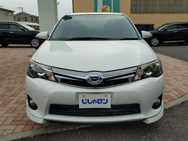トヨタ カローラ フィールダー HV G エアロツアラー W×B 新潟県 2014(平26)年 10.1万km ホワイトパールクリスタルシャイン (株)IDOMが運営する【じしゃロン新潟店】の自社ローン専用車両になります。/こちらは現金またはオートローンご利用時の価格です。自社ローンご希望の方は別途その旨お申付け下さい/純正ナビ/FM/AM/CD視聴可能/ワンセグTV視聴可能(走行中視聴不可)/Bluetooth/AUX接続可能/バックカメラ/ETC/プッシュスタート/ハーフレザー/純正フロアマット/電動格納ウィンカーミラー/横滑り防止装置/ECO/EVモード/スマートキー