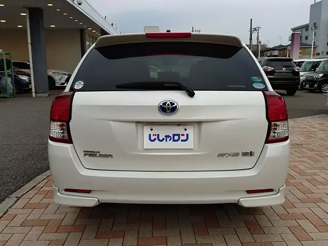 トヨタ カローラ フィールダー HV G エアロツアラー W×B 新潟県 2014(平26)年 10.1万km ホワイトパールクリスタルシャイン (株)IDOMが運営する【じしゃロン新潟店】の自社ローン専用車両になります。/こちらは現金またはオートローンご利用時の価格です。自社ローンご希望の方は別途その旨お申付け下さい/純正ナビ/FM/AM/CD視聴可能/ワンセグTV視聴可能(走行中視聴不可)/Bluetooth/AUX接続可能/バックカメラ/ETC/プッシュスタート/ハーフレザー/純正フロアマット/電動格納ウィンカーミラー/横滑り防止装置/ECO/EVモード/スマートキー