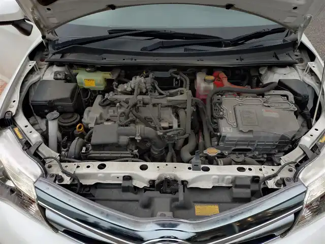 トヨタ カローラ フィールダー HV G エアロツアラー W×B 新潟県 2014(平26)年 10.1万km ホワイトパールクリスタルシャイン (株)IDOMが運営する【じしゃロン新潟店】の自社ローン専用車両になります。/こちらは現金またはオートローンご利用時の価格です。自社ローンご希望の方は別途その旨お申付け下さい/純正ナビ/FM/AM/CD視聴可能/ワンセグTV視聴可能(走行中視聴不可)/Bluetooth/AUX接続可能/バックカメラ/ETC/プッシュスタート/ハーフレザー/純正フロアマット/電動格納ウィンカーミラー/横滑り防止装置/ECO/EVモード/スマートキー