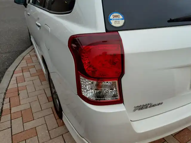 トヨタ カローラ フィールダー HV G エアロツアラー W×B 新潟県 2014(平26)年 10.1万km ホワイトパールクリスタルシャイン (株)IDOMが運営する【じしゃロン新潟店】の自社ローン専用車両になります。/こちらは現金またはオートローンご利用時の価格です。自社ローンご希望の方は別途その旨お申付け下さい/純正ナビ/FM/AM/CD視聴可能/ワンセグTV視聴可能(走行中視聴不可)/Bluetooth/AUX接続可能/バックカメラ/ETC/プッシュスタート/ハーフレザー/純正フロアマット/電動格納ウィンカーミラー/横滑り防止装置/ECO/EVモード/スマートキー