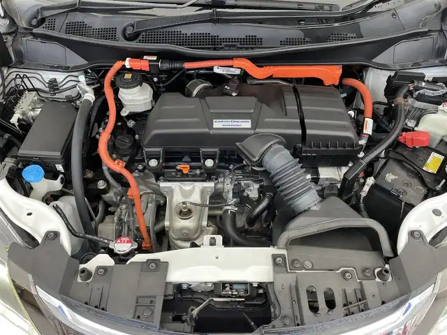 ホンダ オデッセイ ハイブリッド アブソルート・EXホンダセンジング 滋賀県 2018(平30)年 6.3万km プラチナホワイトパール 純正9インチナビ/【Bluetooth/USB/CD/DVD/フルセグTV/HDMI】/ハーフレザーシート/全方位カメラ/両側パワースライドドア/ホンダセンシング/・衝突軽減ブレーキ/・誤発進抑制機能/・歩行者事故低減ステアリング/・路外逸脱抑制機能/・渋滞追従機能付アダプティブクルーズコントロール/・LKAS〈車線維持支援システム〉/・先行車発進お知らせ機能/・標識認識機能/ブラインドスポットインフォメーション/LEDヘッドライト/クリアランスソナー/前後ドライブレコーダー/ビルトインETC2.0/電動パーキングブレーキ/オートブレーキホールド/D/Nパワーシート/D/Nシートヒーター/2列目オットマン/プッシュスタート/スマートキー/ステアリングリモコン