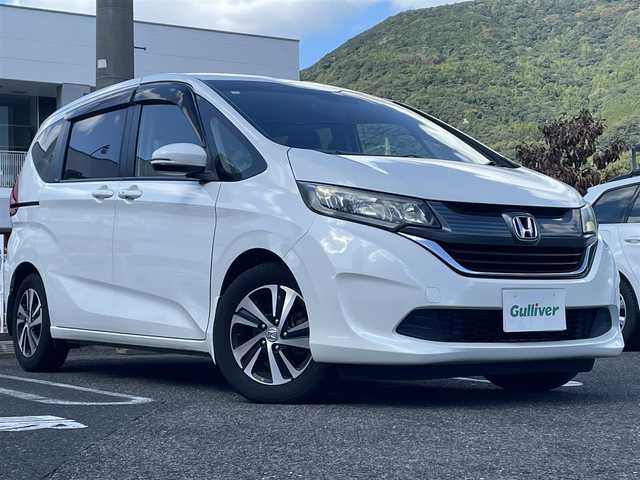 ホンダ フリード G 長崎県 2017(平29)年 7.7万km ホワイトオーキッドパール 純正Gathersインターナビ/・AM/FM/BT/CD/バックカメラ/ステアリングスイッチ/片側パワースライドドア/ビルトインETC/ライトレベライザー/アイドリングストップ/フロアマット/ドアバイザー/保証書/取扱説明書/ナビ取扱説明書/スペアキー