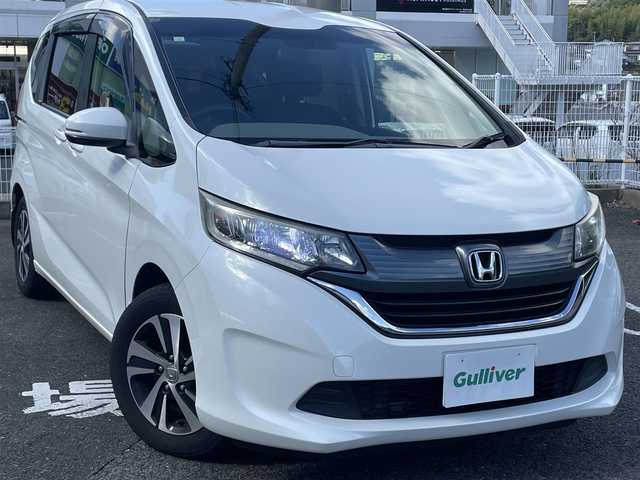 ホンダ フリード G 長崎県 2017(平29)年 7.7万km ホワイトオーキッドパール 純正Gathersインターナビ/・AM/FM/BT/CD/バックカメラ/ステアリングスイッチ/片側パワースライドドア/ビルトインETC/ライトレベライザー/アイドリングストップ/フロアマット/ドアバイザー/保証書/取扱説明書/ナビ取扱説明書/スペアキー