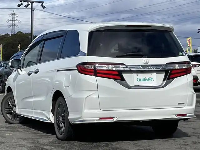 ホンダ オデッセイ アブソルート・EXホンダセンジング 道央・札幌 2017(平29)年 17.3万km ホワイトオーキッドパール ４WD/ワンオーナー/純正メーカーナビ/CD/DVD/BT/フルセグ/純正フリップダウンモニター/ホンダセンシング/衝突被害軽減ブレーキ/横滑り防止装置/アダプティブクルーズコントロール/レーンキープアシスト/パーキングアシスト/ブラインドスポットモニター/全方位カメラ/ビルトインETC/ドライブレコーダー/アイドリングストップ/D席パワーシート/ハーフレザーシート/革巻きステアリング/ステアリングリモコン/パドルシフト/レーダー探知機/プッシュスタート/スマートキー/LEDヘッドライト/オートライト/フォグランプ/電動格納ミラー/ウィンカーミラー/純正フロアマット/ドアバイザー/純正エンジンスターター