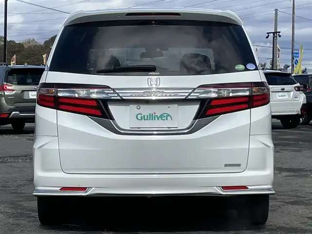 ホンダ オデッセイ アブソルート・EXホンダセンジング 道央・札幌 2017(平29)年 17.3万km ホワイトオーキッドパール ４WD/ワンオーナー/純正メーカーナビ/CD/DVD/BT/フルセグ/純正フリップダウンモニター/ホンダセンシング/衝突被害軽減ブレーキ/横滑り防止装置/アダプティブクルーズコントロール/レーンキープアシスト/パーキングアシスト/ブラインドスポットモニター/全方位カメラ/ビルトインETC/ドライブレコーダー/アイドリングストップ/D席パワーシート/ハーフレザーシート/革巻きステアリング/ステアリングリモコン/パドルシフト/レーダー探知機/プッシュスタート/スマートキー/LEDヘッドライト/オートライト/フォグランプ/電動格納ミラー/ウィンカーミラー/純正フロアマット/ドアバイザー/純正エンジンスターター