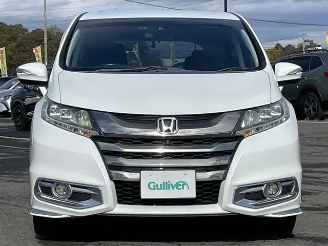 ホンダ オデッセイ アブソルート・EXホンダセンジング 道央・札幌 2017(平29)年 17.3万km ホワイトオーキッドパール ４WD/ワンオーナー/純正メーカーナビ/CD/DVD/BT/フルセグ/純正フリップダウンモニター/ホンダセンシング/衝突被害軽減ブレーキ/横滑り防止装置/アダプティブクルーズコントロール/レーンキープアシスト/パーキングアシスト/ブラインドスポットモニター/全方位カメラ/ビルトインETC/ドライブレコーダー/アイドリングストップ/D席パワーシート/ハーフレザーシート/革巻きステアリング/ステアリングリモコン/パドルシフト/レーダー探知機/プッシュスタート/スマートキー/LEDヘッドライト/オートライト/フォグランプ/電動格納ミラー/ウィンカーミラー/純正フロアマット/ドアバイザー/純正エンジンスターター