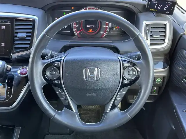 ホンダ オデッセイ アブソルート・EXホンダセンジング 道央・札幌 2017(平29)年 17.3万km ホワイトオーキッドパール ４WD/ワンオーナー/純正メーカーナビ/CD/DVD/BT/フルセグ/純正フリップダウンモニター/ホンダセンシング/衝突被害軽減ブレーキ/横滑り防止装置/アダプティブクルーズコントロール/レーンキープアシスト/パーキングアシスト/ブラインドスポットモニター/全方位カメラ/ビルトインETC/ドライブレコーダー/アイドリングストップ/D席パワーシート/ハーフレザーシート/革巻きステアリング/ステアリングリモコン/パドルシフト/レーダー探知機/プッシュスタート/スマートキー/LEDヘッドライト/オートライト/フォグランプ/電動格納ミラー/ウィンカーミラー/純正フロアマット/ドアバイザー/純正エンジンスターター