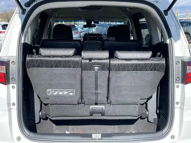 ホンダ オデッセイ アブソルート・EXホンダセンジング 道央・札幌 2017(平29)年 17.3万km ホワイトオーキッドパール ４WD/ワンオーナー/純正メーカーナビ/CD/DVD/BT/フルセグ/純正フリップダウンモニター/ホンダセンシング/衝突被害軽減ブレーキ/横滑り防止装置/アダプティブクルーズコントロール/レーンキープアシスト/パーキングアシスト/ブラインドスポットモニター/全方位カメラ/ビルトインETC/ドライブレコーダー/アイドリングストップ/D席パワーシート/ハーフレザーシート/革巻きステアリング/ステアリングリモコン/パドルシフト/レーダー探知機/プッシュスタート/スマートキー/LEDヘッドライト/オートライト/フォグランプ/電動格納ミラー/ウィンカーミラー/純正フロアマット/ドアバイザー/純正エンジンスターター