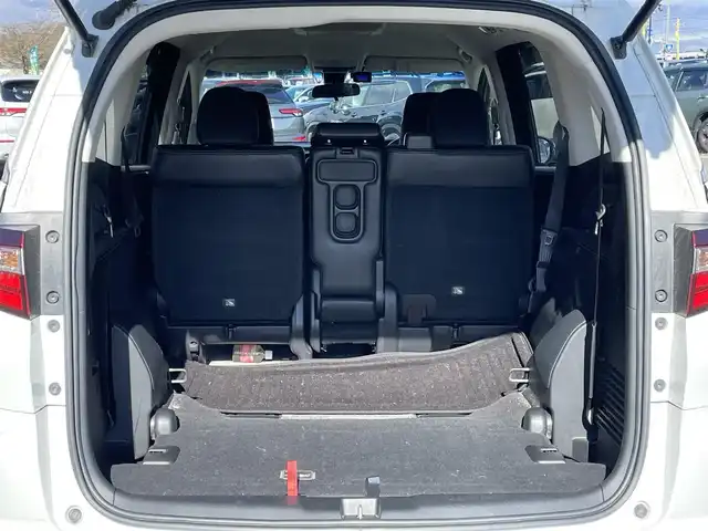 ホンダ オデッセイ アブソルート・EXホンダセンジング 道央・札幌 2017(平29)年 17.3万km ホワイトオーキッドパール ４WD/ワンオーナー/純正メーカーナビ/CD/DVD/BT/フルセグ/純正フリップダウンモニター/ホンダセンシング/衝突被害軽減ブレーキ/横滑り防止装置/アダプティブクルーズコントロール/レーンキープアシスト/パーキングアシスト/ブラインドスポットモニター/全方位カメラ/ビルトインETC/ドライブレコーダー/アイドリングストップ/D席パワーシート/ハーフレザーシート/革巻きステアリング/ステアリングリモコン/パドルシフト/レーダー探知機/プッシュスタート/スマートキー/LEDヘッドライト/オートライト/フォグランプ/電動格納ミラー/ウィンカーミラー/純正フロアマット/ドアバイザー/純正エンジンスターター