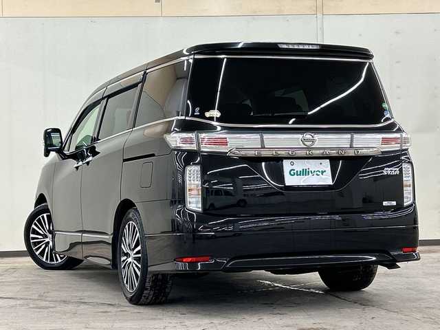 日産 エルグランド 250ハイウェイスター プレミアム 道央・札幌 2014(平26)年 12.6万km ファントムブラック ４WD//純正メモリナビ//フルセグTV//BT・ＳＤ・CD・DVD・ＡＭ・ＦＭ・ＵＳＢ・ＡＵＸ//バックカメラ//両側パワースライドドア//後席用モニター//ドライブレコーダー（前後）//積み込み冬タイヤ//横滑り防止装置//純正エンジンスターター//オットマン//クルーズコントロール//ダブルエアコン//レーダー探知機//ビルトインＥＴＣ//フォグランプ//スペアキー