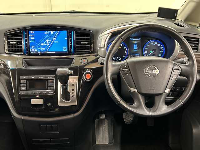 日産 エルグランド 250ハイウェイスター プレミアム 道央・札幌 2014(平26)年 12.6万km ファントムブラック ４WD//純正メモリナビ//フルセグTV//BT・ＳＤ・CD・DVD・ＡＭ・ＦＭ・ＵＳＢ・ＡＵＸ//バックカメラ//両側パワースライドドア//後席用モニター//ドライブレコーダー（前後）//積み込み冬タイヤ//横滑り防止装置//純正エンジンスターター//オットマン//クルーズコントロール//ダブルエアコン//レーダー探知機//ビルトインＥＴＣ//フォグランプ//スペアキー