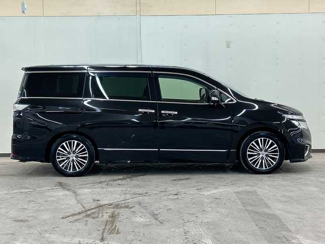 日産 エルグランド 250ハイウェイスター プレミアム 道央・札幌 2014(平26)年 12.6万km ファントムブラック ４WD//純正メモリナビ//フルセグTV//BT・ＳＤ・CD・DVD・ＡＭ・ＦＭ・ＵＳＢ・ＡＵＸ//バックカメラ//両側パワースライドドア//後席用モニター//ドライブレコーダー（前後）//積み込み冬タイヤ//横滑り防止装置//純正エンジンスターター//オットマン//クルーズコントロール//ダブルエアコン//レーダー探知機//ビルトインＥＴＣ//フォグランプ//スペアキー