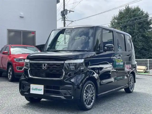 ホンダ Ｎ ＢＯＸ カスタム ターボ 熊本県 2025(令7)年 0.1万km クリスタルブラックパール ディスプレーオーディオ/【Bluetooth/SD/AVX/USB】/バックカメラ/両側パワースライドドア/ホンダセンシング/レーダークルーズコントロール/衝突軽減ブレーキ/レーンキープアシスト/革調シートカバー/シートヒーター/パドルシフト/純正15インチAW/ETC/オートLEDヘッドライト/ウィンカーミラー/プッシュスタート/横滑り防止/ABS/盗難防止装置