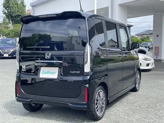 ホンダ Ｎ ＢＯＸ カスタム ターボ 熊本県 2025(令7)年 0.1万km クリスタルブラックパール ディスプレーオーディオ/【Bluetooth/SD/AVX/USB】/バックカメラ/両側パワースライドドア/ホンダセンシング/レーダークルーズコントロール/衝突軽減ブレーキ/レーンキープアシスト/革調シートカバー/シートヒーター/パドルシフト/純正15インチAW/ETC/オートLEDヘッドライト/ウィンカーミラー/プッシュスタート/横滑り防止/ABS/盗難防止装置