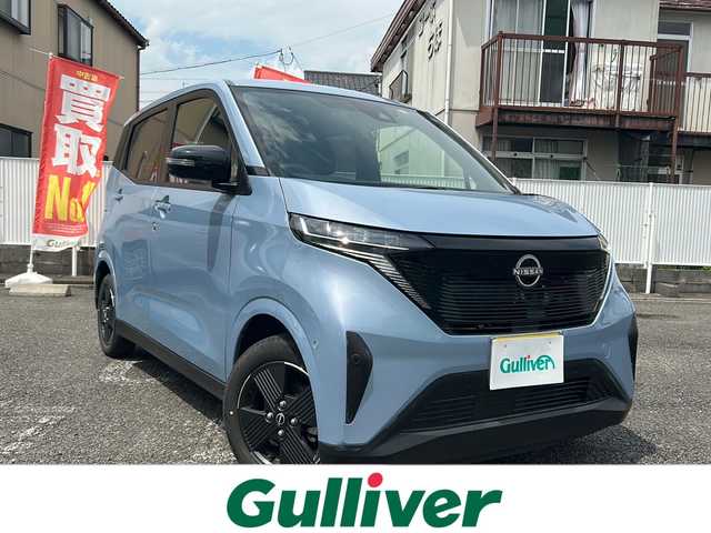 日産 サクラ X 岐阜県 2022(令4)年 0.1万km ライトブルー ワンオーナー/純正ディスプレイオーディオ/BTオーディオ/FM/AM/USB/iPod/プロパイロット/e-ペダル/バックカメラ/アラウンドビューモニター/ドライブレコーダー/エマージェンシーブレーキ/車線逸脱警報/充電ケーブル車載/プッシュスタート/純正フロアマット
