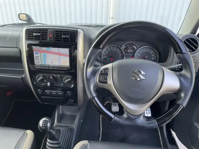 スズキ ジムニー ランドベンチャー 愛媛県 2017(平29)年 4.8万km ブルーイッシュブラックパール3 4WD/SDナビ/BT/CD/DVD/フルセグTV/ハーフレザーシート/ETC/シートヒーター/純正アルミホイール/純正フロアマット/フォグランプ/背面タイヤ/リモコンキー/AC