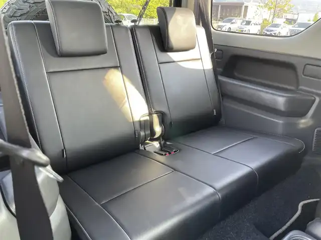 スズキ ジムニー ランドベンチャー 愛媛県 2017(平29)年 4.8万km ブルーイッシュブラックパール3 4WD/SDナビ/BT/CD/DVD/フルセグTV/ハーフレザーシート/ETC/シートヒーター/純正アルミホイール/純正フロアマット/フォグランプ/背面タイヤ/リモコンキー/AC