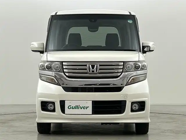 ホンダ Ｎ ＢＯＸ カスタム G SSパッケージ 福岡県 2014(平26)年 4.6万km プレミアムホワイトパール 社外７型ナビ（フルセグＴＶ）　/シティブレーキアクティブシステム　/横滑り防止　/ＥＣＯＮモード　/電動格納ミラー　/プッシュスタート　/両側電動スライドドア　/オートライト　/純正フロアマット　/純正１４インチＡＷ