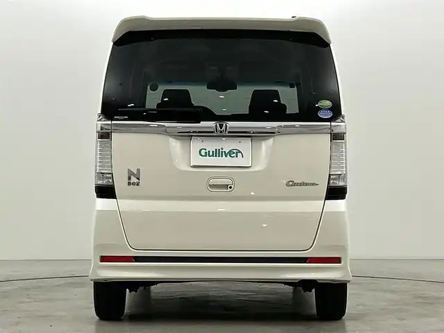 ホンダ Ｎ ＢＯＸ カスタム G SSパッケージ 福岡県 2014(平26)年 4.6万km プレミアムホワイトパール 社外７型ナビ（フルセグＴＶ）　/シティブレーキアクティブシステム　/横滑り防止　/ＥＣＯＮモード　/電動格納ミラー　/プッシュスタート　/両側電動スライドドア　/オートライト　/純正フロアマット　/純正１４インチＡＷ