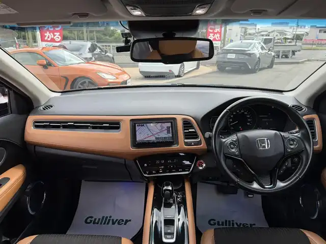 ホンダ ヴェゼル ハイブリッド Z ホンダセンシング 香川県 2018(平30)年 5万km ミッドナイトブルービームM 社外SDナビ/フルセグ/CD/DVD/Bluetooth/バックカメラ/ホンダセンシング/レーダークルーズ/ハーフレザーシート/シートヒーター/ーフレール/コーナーセンサー/LEDヘッドライト/ETC