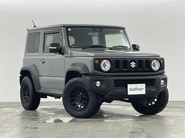 スズキ ジムニー シエラ JC 福島県 2021(令3)年 3.5万km ミディアムグレー ４WD/ワンオーナー/純正SDナビ/ 【BT/CD/DVD/フルセグTV/AM/FM】/プッシュスタート/クルーズコントロール/ステアリングスイッチ/シートヒーター/ (D席/N席）/ビルトインETC/ドライブレコーダー/フロアマット/電動格納ミラー/ドアバイザー/オートライト/LEDヘッドライト/・フォグランプ/背面タイヤ/社外16インチAW/スマートキー/。スペアキー/ダウンヒルアシストコントロール/レーンキープアシスト/衝突被害軽減システム/・保証書/・取扱説明書
