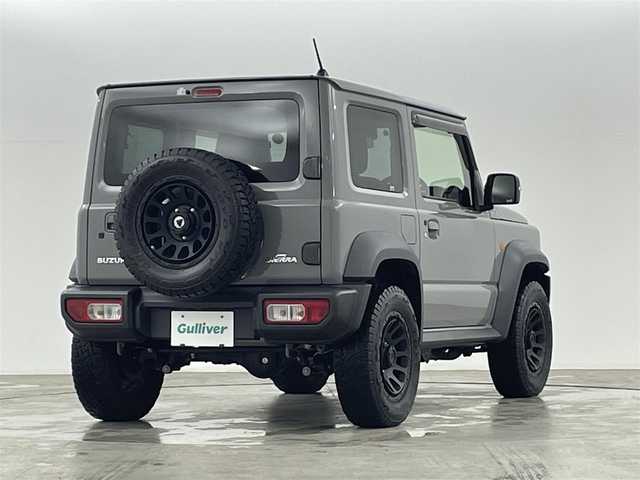 スズキ ジムニー シエラ JC 福島県 2021(令3)年 3.5万km ミディアムグレー ４WD/ワンオーナー/純正SDナビ/ 【BT/CD/DVD/フルセグTV/AM/FM】/プッシュスタート/クルーズコントロール/ステアリングスイッチ/シートヒーター/ (D席/N席）/ビルトインETC/ドライブレコーダー/フロアマット/電動格納ミラー/ドアバイザー/オートライト/LEDヘッドライト/・フォグランプ/背面タイヤ/社外16インチAW/スマートキー/。スペアキー/ダウンヒルアシストコントロール/レーンキープアシスト/衝突被害軽減システム/・保証書/・取扱説明書