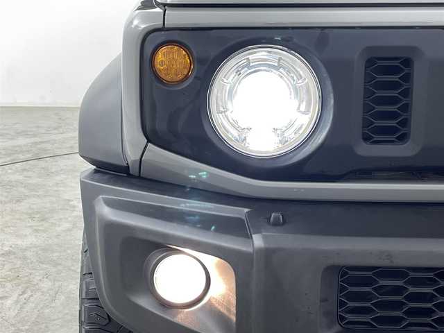 スズキ ジムニー シエラ JC 福島県 2021(令3)年 3.5万km ミディアムグレー ４WD/ワンオーナー/純正SDナビ/ 【BT/CD/DVD/フルセグTV/AM/FM】/プッシュスタート/クルーズコントロール/ステアリングスイッチ/シートヒーター/ (D席/N席）/ビルトインETC/ドライブレコーダー/フロアマット/電動格納ミラー/ドアバイザー/オートライト/LEDヘッドライト/・フォグランプ/背面タイヤ/社外16インチAW/スマートキー/。スペアキー/ダウンヒルアシストコントロール/レーンキープアシスト/衝突被害軽減システム/・保証書/・取扱説明書