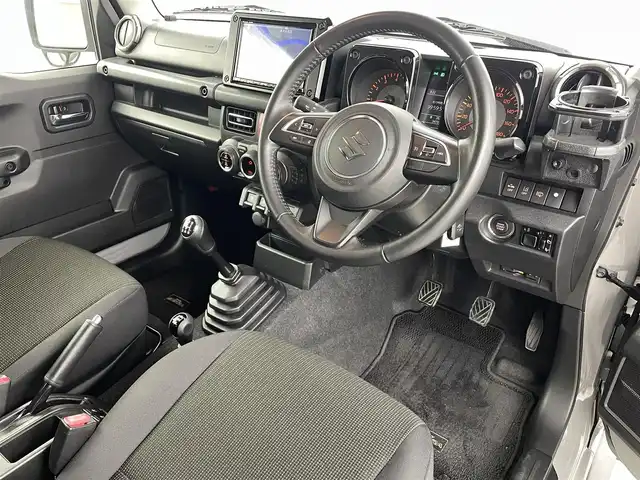 スズキ ジムニー シエラ JC 福島県 2021(令3)年 3.5万km ミディアムグレー ４WD/ワンオーナー/純正SDナビ/ 【BT/CD/DVD/フルセグTV/AM/FM】/プッシュスタート/クルーズコントロール/ステアリングスイッチ/シートヒーター/ (D席/N席）/ビルトインETC/ドライブレコーダー/フロアマット/電動格納ミラー/ドアバイザー/オートライト/LEDヘッドライト/・フォグランプ/背面タイヤ/社外16インチAW/スマートキー/。スペアキー/ダウンヒルアシストコントロール/レーンキープアシスト/衝突被害軽減システム/・保証書/・取扱説明書