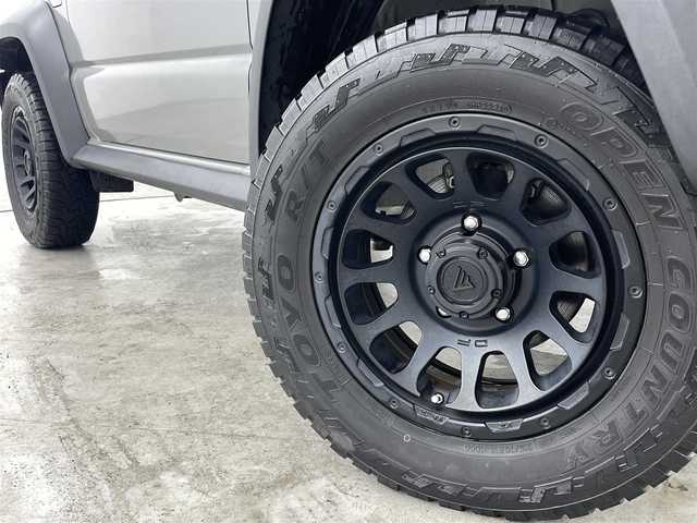 スズキ ジムニー シエラ JC 福島県 2021(令3)年 3.5万km ミディアムグレー ４WD/ワンオーナー/純正SDナビ/ 【BT/CD/DVD/フルセグTV/AM/FM】/プッシュスタート/クルーズコントロール/ステアリングスイッチ/シートヒーター/ (D席/N席）/ビルトインETC/ドライブレコーダー/フロアマット/電動格納ミラー/ドアバイザー/オートライト/LEDヘッドライト/・フォグランプ/背面タイヤ/社外16インチAW/スマートキー/。スペアキー/ダウンヒルアシストコントロール/レーンキープアシスト/衝突被害軽減システム/・保証書/・取扱説明書