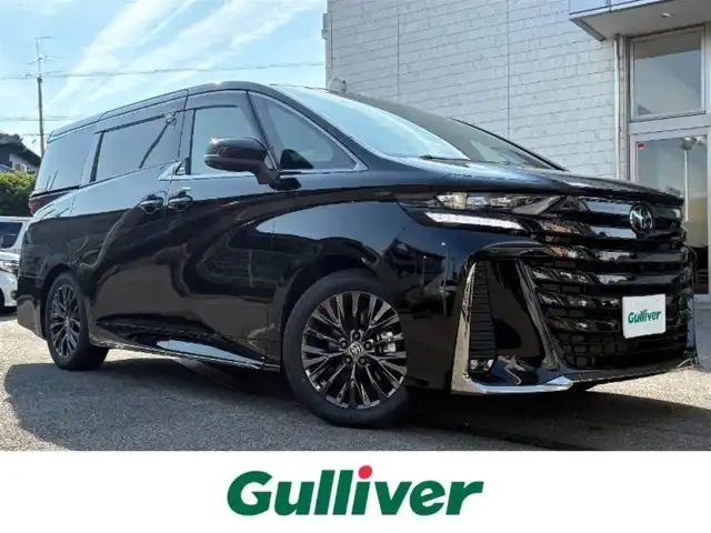 トヨタ ヴェルファイア ハイブリット Z プレミア 愛知県 2025(令7)年 0.1万km ブラック ワンオーナー/純正メーカーナビ/AMFM/フルセグ/BT/USB/HDMI/TVキャンセラー/デジタルインナーミラー/スペアタイヤ/アラウンドビューモニター/ビルトインETC2.0/サンセットブラウンレザーシート/パワーシート/メモリシート/シートヒーター、エアシート/前後ドライブレコーダー/ガラスルーフ/100V電源/両側パワースライドドア/パワーバックドア/トヨタセーフティセンス/ステアリングヒーター/HUD/保証書/取扱説明書/スペアキー