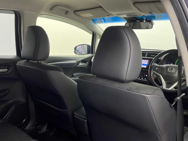 ホンダ シャトル ハイブリッド X ホンダセンシング 栃木県 2017(平29)年 6.3万km ミッドナイトブルービームM 純正ナビ（VXM-184VFi）/（BT/ワンセグ/CD/DVD/AM/FM)/衝突軽減システム/追従クルーズコントロール　/横滑り防止/先行車発進お知らせ/標識認識機能/車線逸脱抑制機能/バックカメラ　/シートヒーター　/ビルドインＥＴＣ　/ドライブレコーダー　/ＬＥＤヘッドライト　/ステアリングスイッチ/プッシュスタート/スマートキー/スペアキー　/純正アルミホイール/純正フロアマット