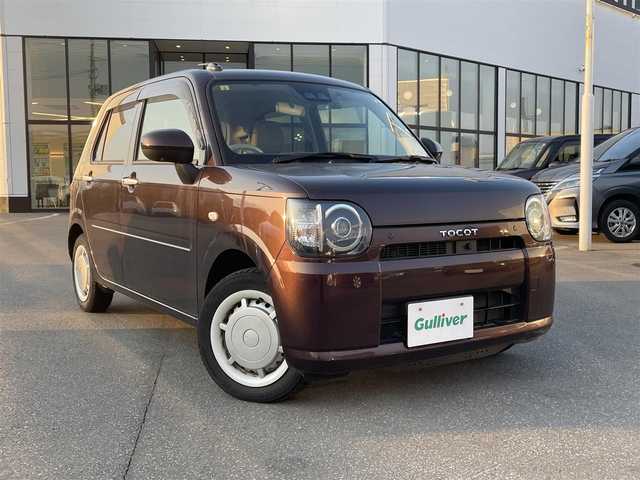 ダイハツ ミラ トコット G SA Ⅲ 青森県 2018(平30)年 7.3万km プラムブラウンクリスタルマイカ ・４WD/・社外フルセグナビ/・フルセグ/・全方位カメラ/・CD/DVD/AM/FM/・オートハイビーム/・オートライト/・衝突軽減ブレーキ/・横滑り抑制装置/・コーナーセンサー/・アイドリングストップ/・純正フロアマット/・前後ドライブレコーダー/・前席シートヒーター/・シガーソケット/・USBソケット/・ドアバイザー/・取扱説明書/・保証書
