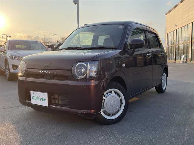 ダイハツ ミラ トコット G SA Ⅲ 青森県 2018(平30)年 7.3万km プラムブラウンクリスタルマイカ ・４WD/・社外フルセグナビ/・フルセグ/・全方位カメラ/・CD/DVD/AM/FM/・オートハイビーム/・オートライト/・衝突軽減ブレーキ/・横滑り抑制装置/・コーナーセンサー/・アイドリングストップ/・純正フロアマット/・前後ドライブレコーダー/・前席シートヒーター/・シガーソケット/・USBソケット/・ドアバイザー/・取扱説明書/・保証書