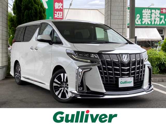 トヨタ アルファード S Cパッケージ 東京都 2022(令4)年 3.1万km ホワイトパールクリスタルシャイン HDDナビ（Bluetooth、AppleCarPlay、フルセグTV、DVD試聴）/JBLサウンド/ビルトインETC/モデリスタフルエアロ/バック・全方位カメラ/オットマン/純正後席モニター/運転席助手席パワーシート/運転席シートメモリー/運転席助手席シートヒーター・エアシート/クルーズコントロール（追従機能）/サンルーフ（前席、後席）/プッシュスタート/電動リアゲート/アドバンスドパーク（インテリジェントパーキングアシスト）/本革シート/両側パワースライドドア/ドライブレコーダー/USB入力端子/純正アルミホイール/レーンキープアシスト/保証書/純正フロアマット/３列シート/取扱説明書/保証書/コーナーセンサー
