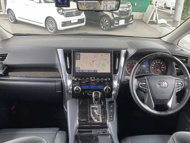 トヨタ アルファード S Cパッケージ 東京都 2022(令4)年 3.1万km ホワイトパールクリスタルシャイン HDDナビ（Bluetooth、AppleCarPlay、フルセグTV、DVD試聴）/JBLサウンド/ビルトインETC/モデリスタフルエアロ/バック・全方位カメラ/オットマン/純正後席モニター/運転席助手席パワーシート/運転席シートメモリー/運転席助手席シートヒーター・エアシート/クルーズコントロール（追従機能）/サンルーフ（前席、後席）/プッシュスタート/電動リアゲート/アドバンスドパーク（インテリジェントパーキングアシスト）/本革シート/両側パワースライドドア/ドライブレコーダー/USB入力端子/純正アルミホイール/レーンキープアシスト/保証書/純正フロアマット/３列シート/取扱説明書/保証書/コーナーセンサー