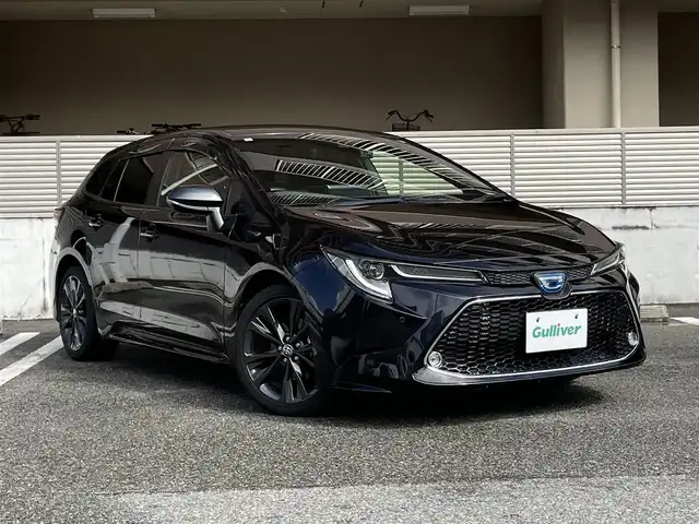 トヨタ カローラツーリング ハイブリッド ダブルバイビー 大阪府 2020(令2)年 11.2万km スパークリングブラックパールクリスタルシャイン ワンオーナー/9インチディスプレイオーディオ/・AM/FM/BT/フルセグTV/バックカメラ/ETC/ドライブレコーダー【TZ-D205W】/Toyota Safety Sense/・プリクラッシュセーフティー/・レーントレーシングアシスト/・レーンディバーチャーアラート/・レーダークルーズコントロール/・オートマティックハイビーム/・ロードサインアシスト/インテリジェントクリアランスソナー/プッシュスタート/電子パーキングブレーキ/スペアキー1本/保証書/取扱説明書/記録簿 R6 R5 R4 R3