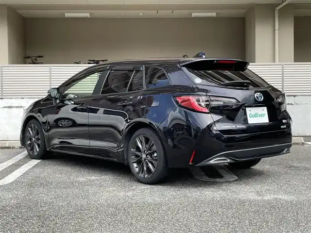 トヨタ カローラツーリング ハイブリッド ダブルバイビー 大阪府 2020(令2)年 11.2万km スパークリングブラックパールクリスタルシャイン ワンオーナー/9インチディスプレイオーディオ/・AM/FM/BT/フルセグTV/バックカメラ/ETC/ドライブレコーダー【TZ-D205W】/Toyota Safety Sense/・プリクラッシュセーフティー/・レーントレーシングアシスト/・レーンディバーチャーアラート/・レーダークルーズコントロール/・オートマティックハイビーム/・ロードサインアシスト/インテリジェントクリアランスソナー/プッシュスタート/電子パーキングブレーキ/スペアキー1本/保証書/取扱説明書/記録簿 R6 R5 R4 R3