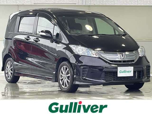 ホンダ フリード ハイブリット 秋田県 2011(平23)年 7.3万km プレミアムブラキッシュパール ・社外ナビ/・Bluetooth/・フルセグTV（CD・DVD再生可）/・バックカメラ/・ETC/・片側パワースライドドア/・スペアキー