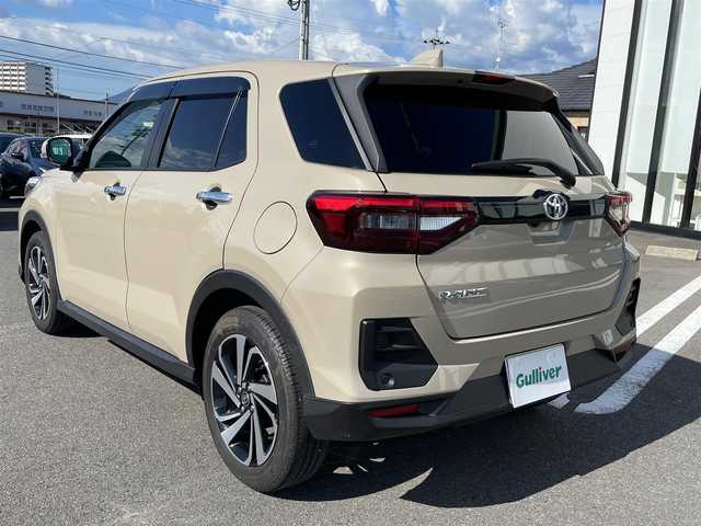 トヨタ ライズ Z 長崎県 2023(令5)年 1.4万km ナチュラルベージュマイカM ワンオーナー/全方位カメラ/純正9型ディスプレイオーディオ/トヨタセーフティセンス/スペアキー/前席シートヒーター/ブラインドスポットモニター/レーダークルーズコントロール/ETC/クリアランスソナー/レーンキープアシスト/ステアリングスイッチ/アイドリングストップ/オートライト/LEDヘッドライト/新車保証書/取扱説明書