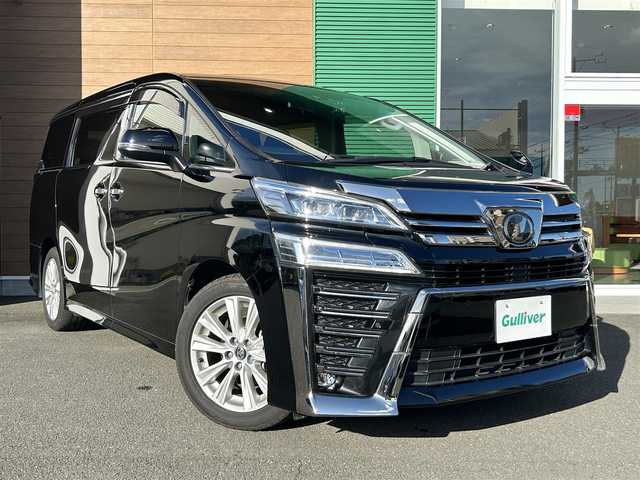 トヨタ ヴェルファイア Z Aエディション 静岡県 2019(平31)年 5.8万km ブラック 純正ディーラーOPナビ【CD/DVD/BT/フルセグTV】/純正フリップダウンモニター/トヨタセーフティセンス/プリクラッシュセーフティ/横滑り防止装置/レーダークルーズコントロール/バックカメラ/ビルトインETC/ドライブレコーダー/アイドリングストップ/GPS（Laser)/ECOMODE/両側パワースライドドア/N席/２列目オットマン/ブレーキホールド/MTモード付AT/プッシュスタート/スマートキー/LEDヘッドライト/オートライト/フォグランプ/電動格納ミラー/ウィンカーミラー/純正フロアマット/ドアバイザー/スペアキー１
