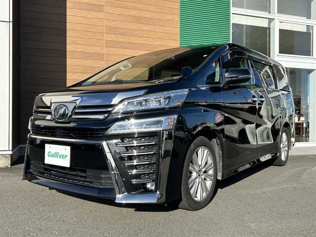 トヨタ ヴェルファイア Z Aエディション 静岡県 2019(平31)年 5.8万km ブラック 純正ディーラーOPナビ【CD/DVD/BT/フルセグTV】/純正フリップダウンモニター/トヨタセーフティセンス/プリクラッシュセーフティ/横滑り防止装置/レーダークルーズコントロール/バックカメラ/ビルトインETC/ドライブレコーダー/アイドリングストップ/GPS（Laser)/ECOMODE/両側パワースライドドア/N席/２列目オットマン/ブレーキホールド/MTモード付AT/プッシュスタート/スマートキー/LEDヘッドライト/オートライト/フォグランプ/電動格納ミラー/ウィンカーミラー/純正フロアマット/ドアバイザー/スペアキー１