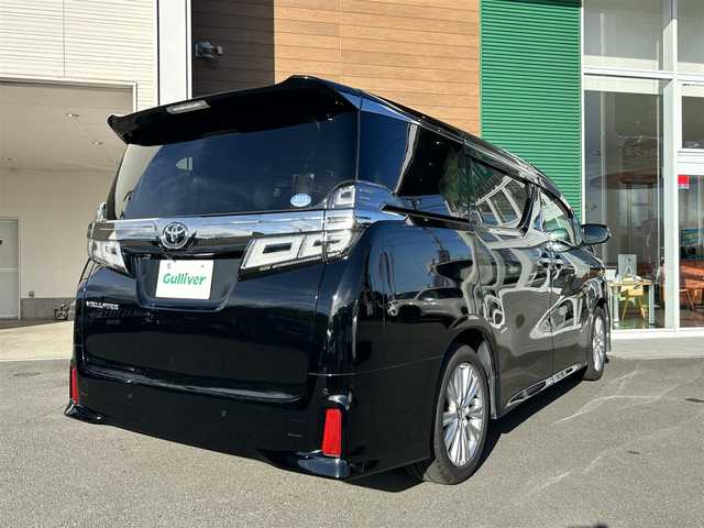 トヨタ ヴェルファイア Z Aエディション 静岡県 2019(平31)年 5.8万km ブラック 純正ディーラーOPナビ【CD/DVD/BT/フルセグTV】/純正フリップダウンモニター/トヨタセーフティセンス/プリクラッシュセーフティ/横滑り防止装置/レーダークルーズコントロール/バックカメラ/ビルトインETC/ドライブレコーダー/アイドリングストップ/GPS（Laser)/ECOMODE/両側パワースライドドア/N席/２列目オットマン/ブレーキホールド/MTモード付AT/プッシュスタート/スマートキー/LEDヘッドライト/オートライト/フォグランプ/電動格納ミラー/ウィンカーミラー/純正フロアマット/ドアバイザー/スペアキー１
