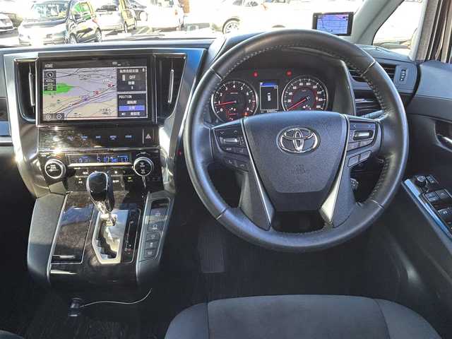 トヨタ ヴェルファイア Z Aエディション 静岡県 2019(平31)年 5.8万km ブラック 純正ディーラーOPナビ【CD/DVD/BT/フルセグTV】/純正フリップダウンモニター/トヨタセーフティセンス/プリクラッシュセーフティ/横滑り防止装置/レーダークルーズコントロール/バックカメラ/ビルトインETC/ドライブレコーダー/アイドリングストップ/GPS（Laser)/ECOMODE/両側パワースライドドア/N席/２列目オットマン/ブレーキホールド/MTモード付AT/プッシュスタート/スマートキー/LEDヘッドライト/オートライト/フォグランプ/電動格納ミラー/ウィンカーミラー/純正フロアマット/ドアバイザー/スペアキー１