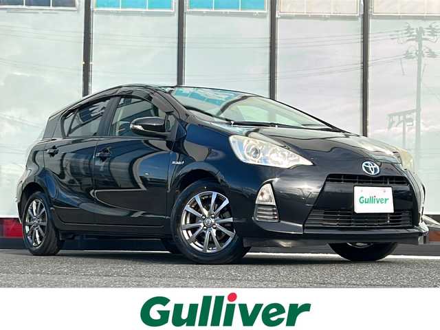 トヨタ アクア S 山形県 2013(平25)年 7.7万km ブラックマイカ 寒冷地仕様/横滑り防止装置/社外SDナビ/（Bluetooth/CD/DVD/フルセグ)/バックカメラ/オートライト/フォグランプ/DN席シートヒーター/ステアリングスイッチ/ETC/社外AW/純正フロアマット/電動格納ウィンカーミラー/スマートキー/ドアバイザー