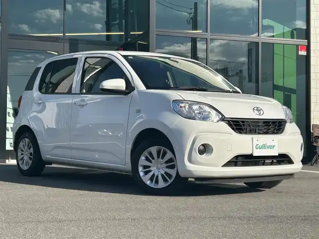 トヨタ パッソ X Lパッケージ S 愛媛県 2018(平30)年 1.9万km ホワイト 純正SDナビ（Bluetooth/ワンセグテレビ）/バックカメラ/ETC/布シート/SDミュージックサーバー/AUX接続可能/純正フロアマット/クリアランスソナー/ABS/横滑り防止装置/盗難防止装置/ハロゲンヘッドライト/スマートキー×２