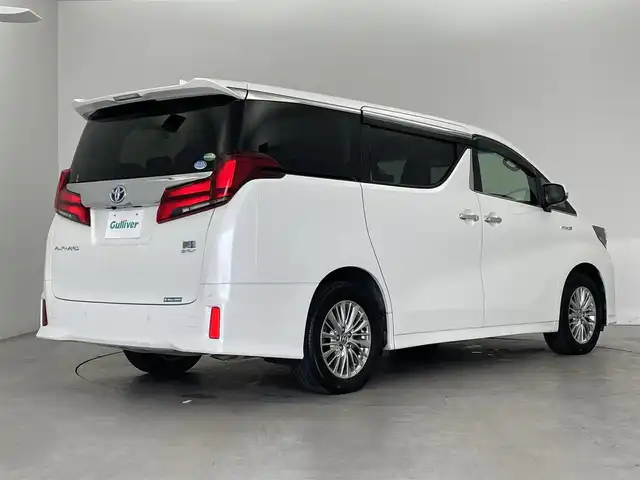 トヨタ アルファードハイブリット SR 埼玉県 2019(令1)年 5.1万km ホワイトパールクリスタルシャイン ４WD/純正10インチナビ/純正12インチフリップダウンモニター/トヨタセーフティーセンス/・プリクラッシュセーフティー/・レーントレーシングアシスト/・クリアランスソナー/・パーキングサポートブレーキ/・ブラインドスポットモニター/前後ドライブレコーダー/両側パワースライドドア/レーダークルーズコントロール/デジタルインナーミラー/バックカメラ/シートヒーター/エアシート/パワーシート/シートメモリー/Bluetooth/CD、DVD/LEDヘッドライト/LEDフォグランプ/オートライト/オートマチックハイビーム/純正フロアマット/純正アルミホイール