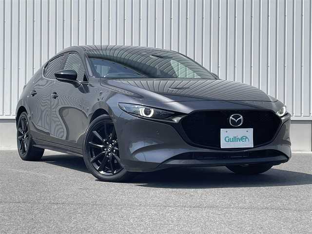 マツダ マツダ３ファストバック 20S ブラックトーンED 群馬県 2022(令4)年 1.9万km マシーングレープレミアムM ワンオーナー/寒冷地仕様/マツダコネクトナビ/（CD/DVD/Bluetooth/USB/フルセグ）/バックカメラ/アラウンドビューモニター/I-ACTIVSENSE/・スマート・ブレーキ・サポート（SBS）/・レーンキープ・アシスト・システム（LAS）/・ブラインド・スポット・モニタリング（BSM）/・ハイビーム・コントロール（HBC）/レーダークルーズコントロール/D席パワーシート/D/Nシートヒーター/アイドリングストップ/BOSEサウンドシステム/ETC/前後ドライブレコーダー/ステアリングスイッチ/F/Rコーナーセンサー/純正フロアマット/純正18インチAW/LED/スペアキー×1/保証書/取説