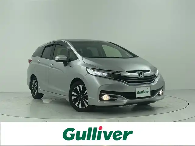 ホンダ シャトル ハイブリッド X スタイルエディション 大阪府 2016(平28)年 5.7万km アラバスターシルバーメタリック 衝突軽減ブレーキ/社外SDナビ[地図SDなし、動作未確認]/　・フルセグ/バックカメラ/LEDヘッドライト/オートライト/フォグランプ/ハーフレザーシート/スマートキー/ステアリングスイッチ/パドルシフト/ETC