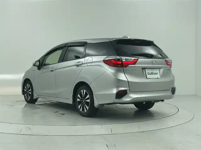 ホンダ シャトル ハイブリッド X スタイルエディション 大阪府 2016(平28)年 5.7万km アラバスターシルバーメタリック 衝突軽減ブレーキ/社外SDナビ[地図SDなし、動作未確認]/　・フルセグ/バックカメラ/LEDヘッドライト/オートライト/フォグランプ/ハーフレザーシート/スマートキー/ステアリングスイッチ/パドルシフト/ETC